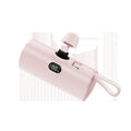Capsule-shaped digital display power bank in multiple colours showing its size and built-in plug.