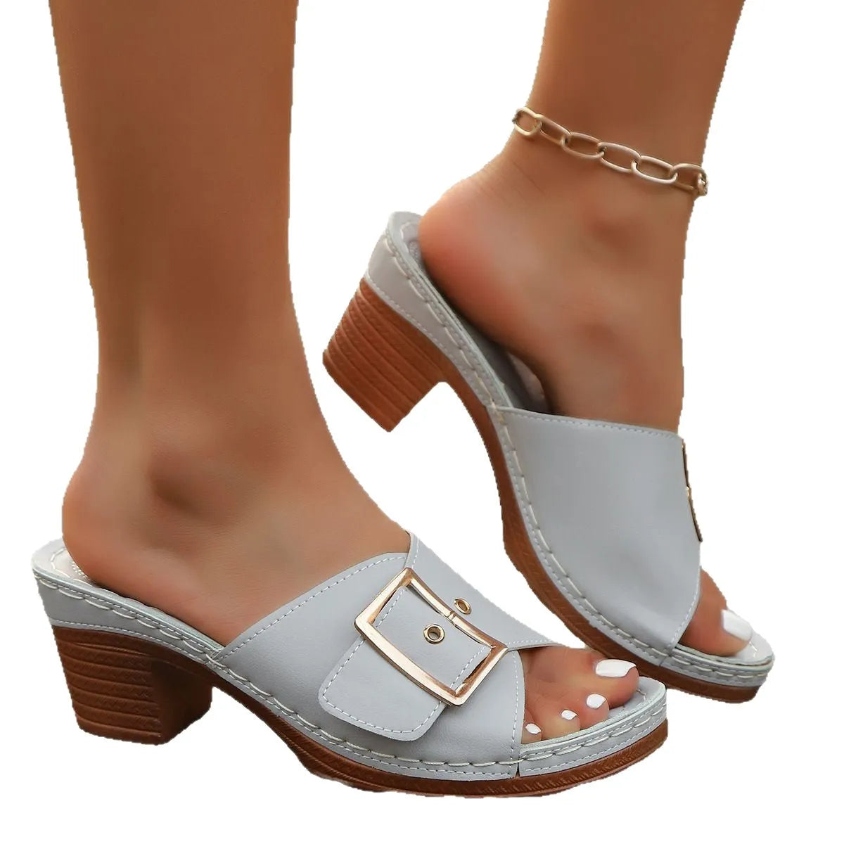 Women's black retro chunky heel sandals with a round toe and silver metal buckle on a rubber sole.
