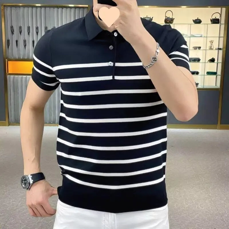 Man wearing a black and white striped knit t-shirt with a lapel collar, casual pullover style.