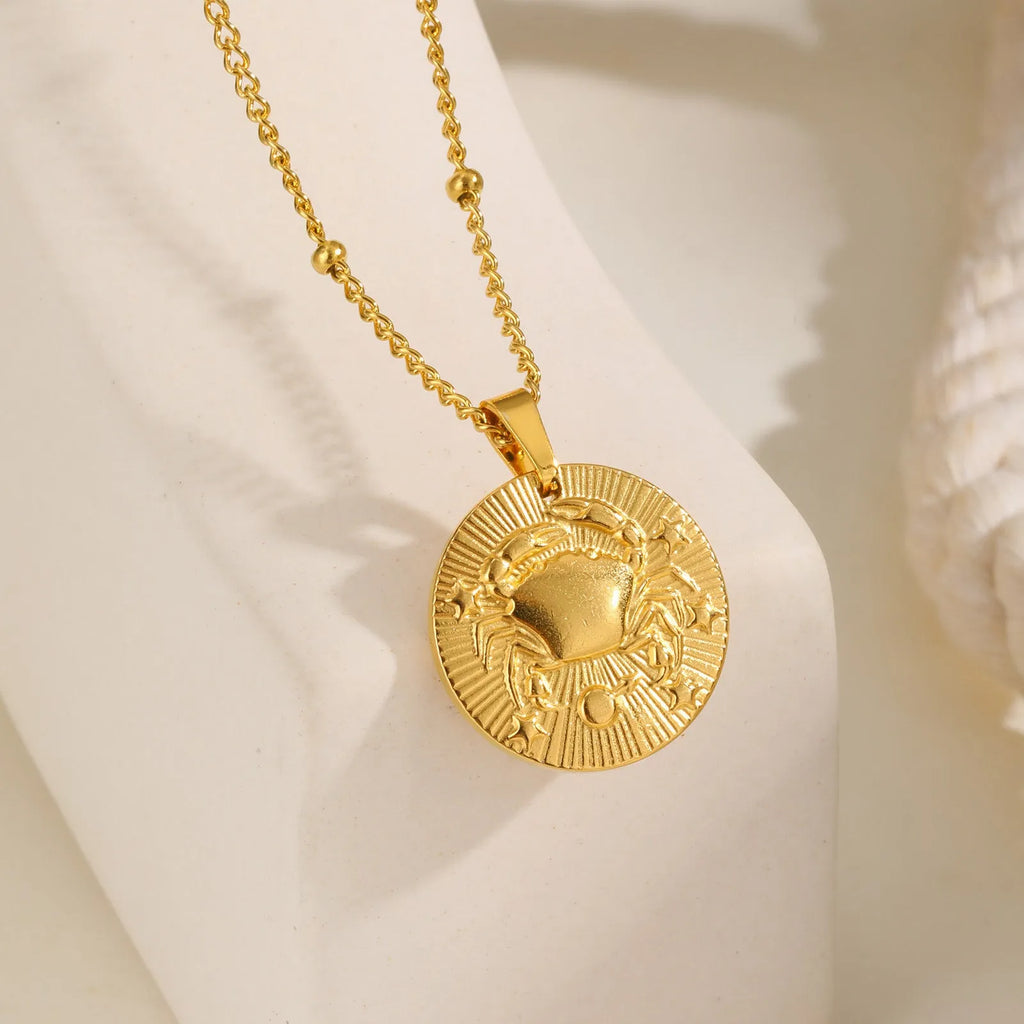 Stainless steel zodiac necklace with cross chain design and embossed constellation pendant