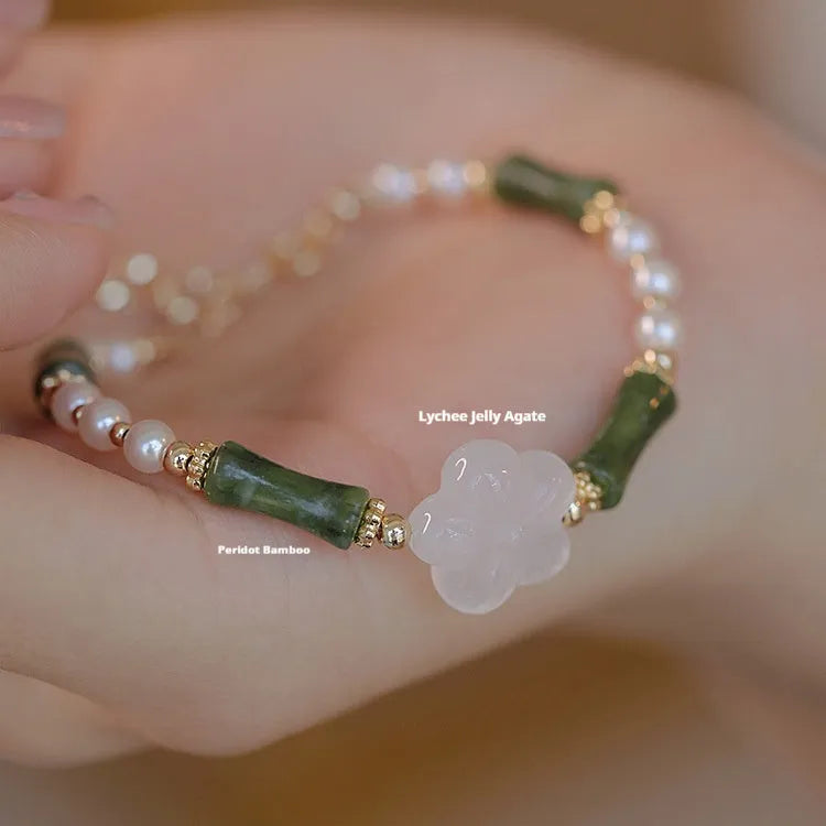 Women's Chinese style Hetian jade bracelet with bamboo joint design and shell pearl beads