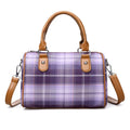 Plaid academy style round barrel canvas shoulder bag with three-dimensional pocket, available in blue plaid.