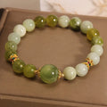 Women's Xiuyan jade bracelet in post-rain green colour with original design