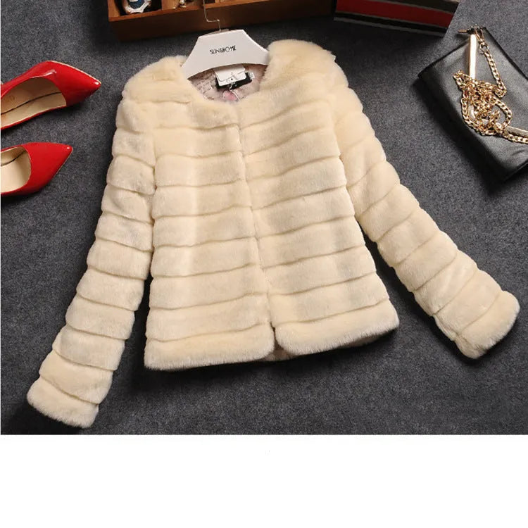 Women's short artificial fur top in beige colour with regular sleeves on a model.