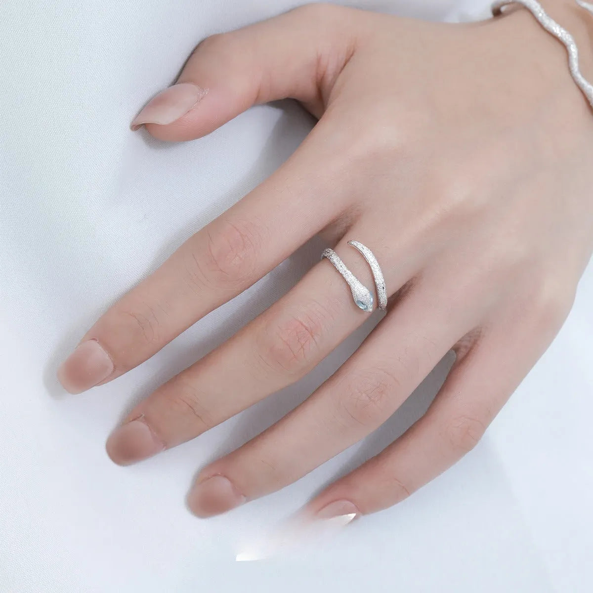 Adjustable opening silver snake ring with electroplated platinum colour finish, animal zodiac design