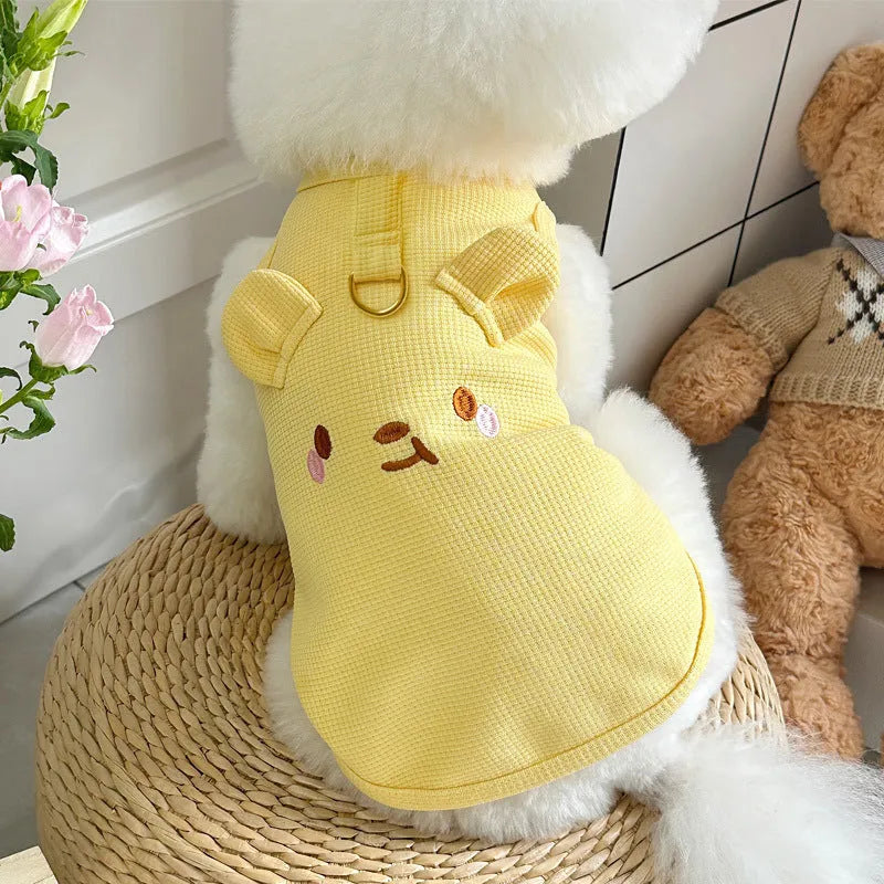 Yellow waffle-texture polyester vest for a small dog, showing sleeveless design and casual fit.