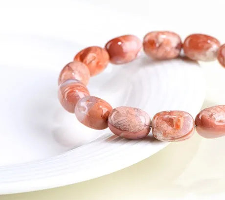 Natural cherry agate barrel bead bracelet with ruyi decorative elements