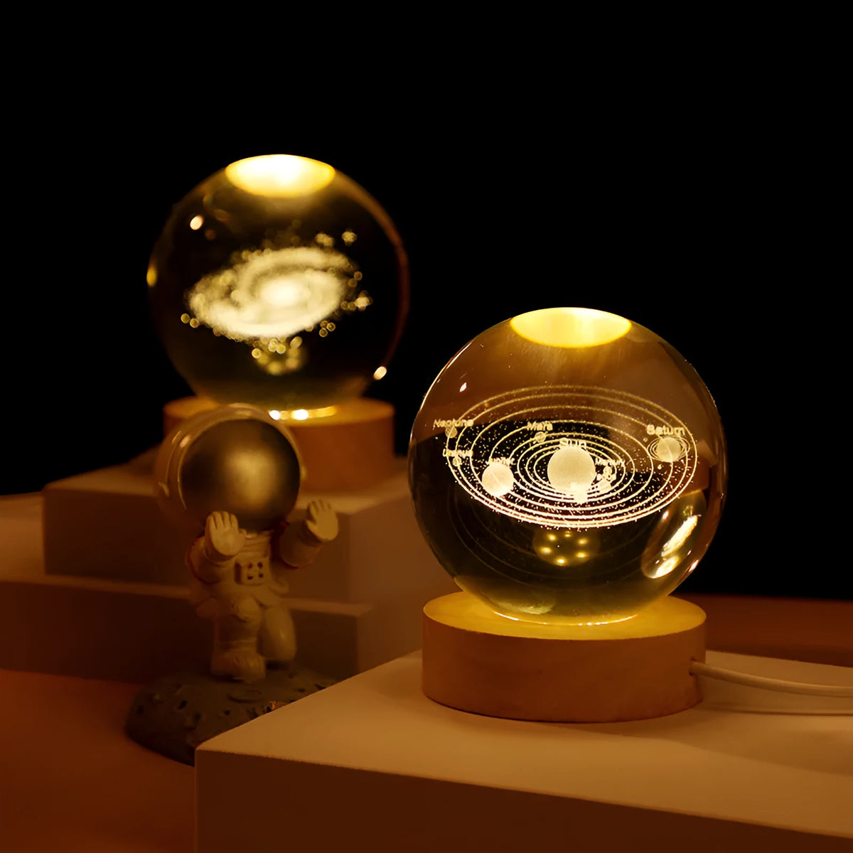 Luminous crystal ball night light on round wooden base with optional astronaut push, 6cm or 8cm sphere