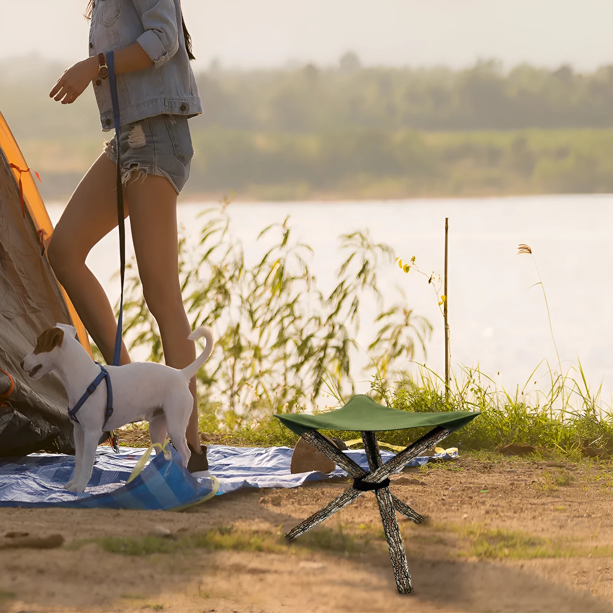 Folding portable camping stool with triangular fabric seat in black