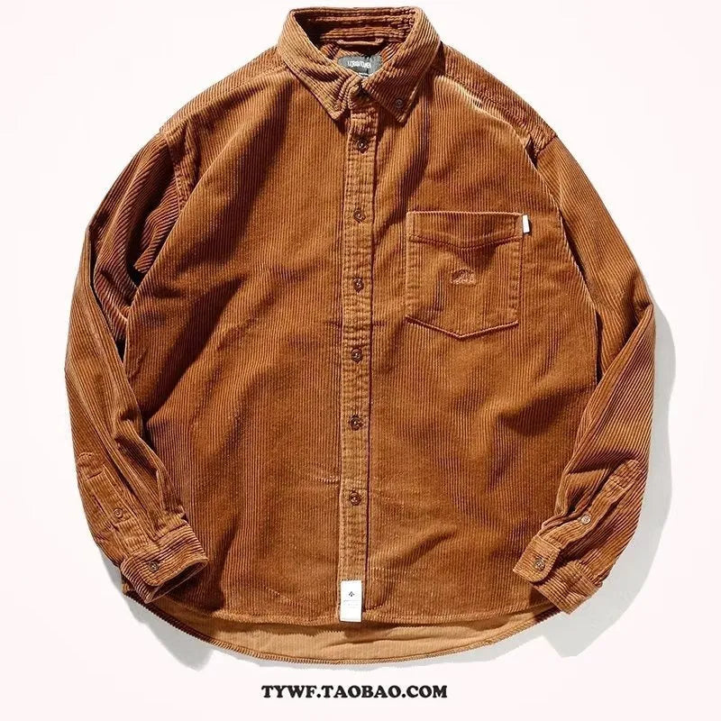 A loose-fitting caramel corduroy shirt with long sleeves in a casual cardigan style.