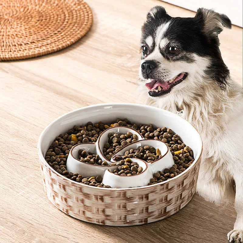 Blue ceramic slow feeder dog bowl with maze pattern and non-slip rubber base for large dogs.