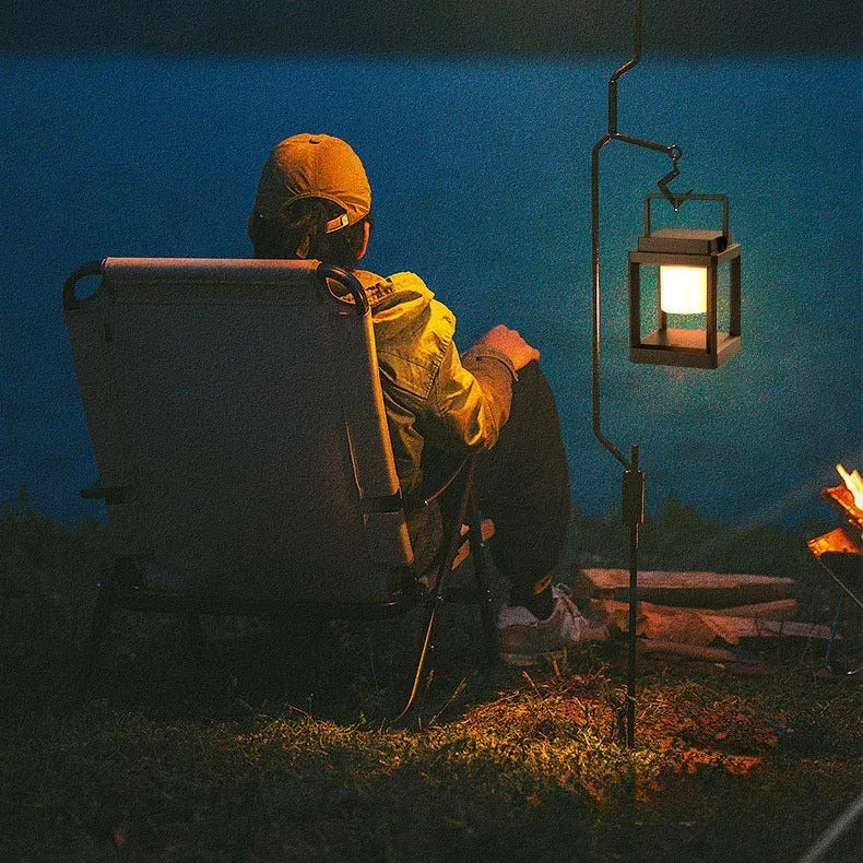 Outdoor USB handheld multifunctional charging ambient light lantern with black cover and white shell