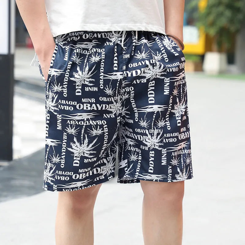 Men's floral printed swimming trunks with five-point cut design in polyester fabric