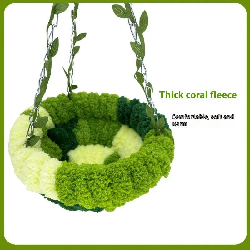 Deep forest green bird nest hammock with green leaves and swing for parrots