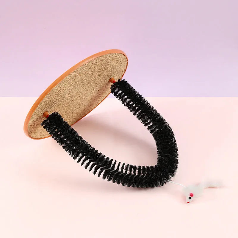 Black arch-shaped cat grooming brush with attached mouse toy on non-slip base