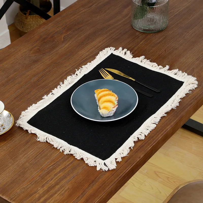 Square polyester placemat in beige or white, sizes 30x30cm and 45x30cm, for dining table protection.