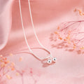 S925 silver cherry pendant necklace with adjustable snake bones chain on a white background.