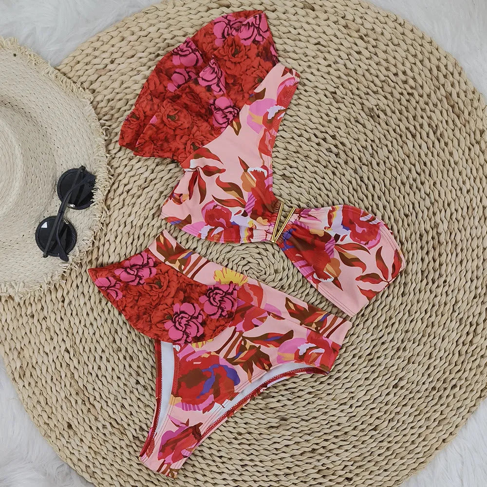 Women's one-shoulder pink floral high-waist bikini swimsuit with ruffled detailing