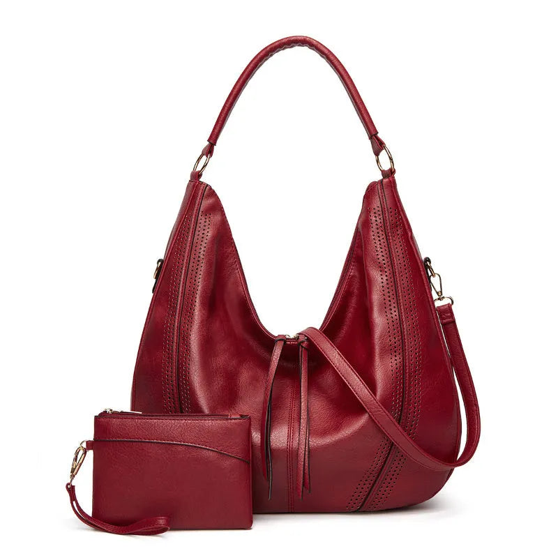 Retro large capacity PU tote shoulder bag with tassel hollow detailing and zipper closure in white