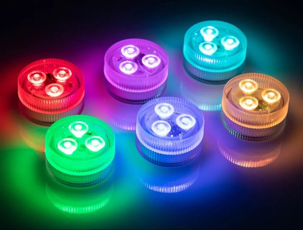 Small white rectangular submersible LED light with remote control for aquarium colour lighting.