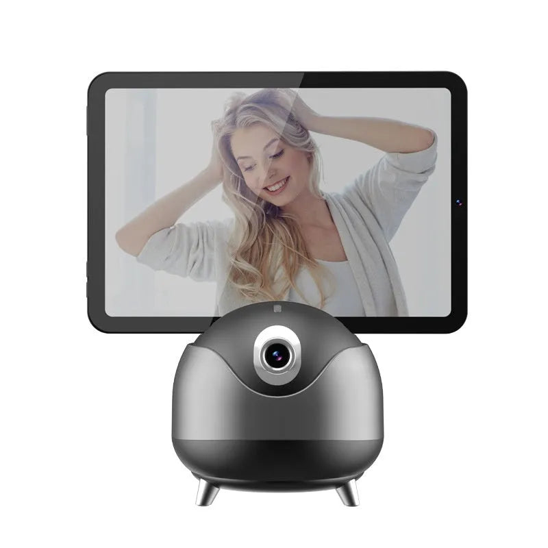 Q8 dual-axis AI face recognition phone stabiliser with ABS housing on a desk