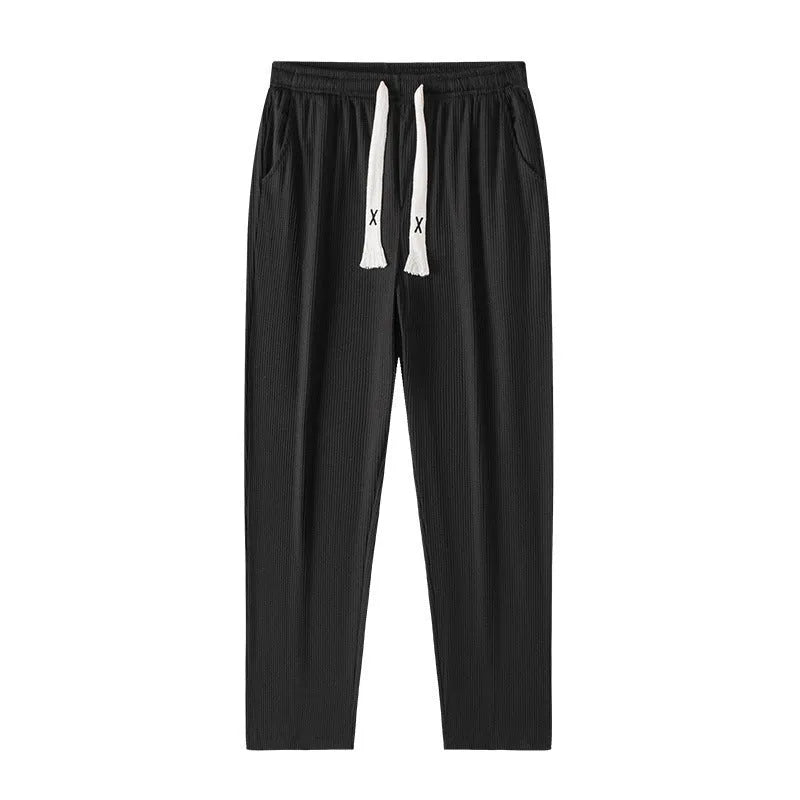 Cropped casual loose men's long pants in 100% polyester, tapered leg, mid waist, available in multiple colours