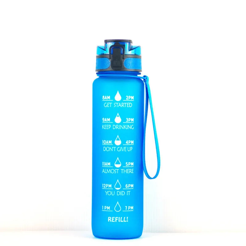 Transparent 1000ml plastic water bottle showing clear Tritan construction with visible liquid