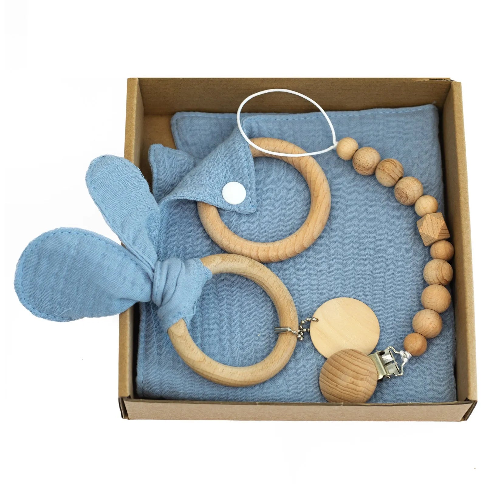 Baby teething gift set with bamboo gauze blanket, wooden chewing ring, woven bell, and developmental toys