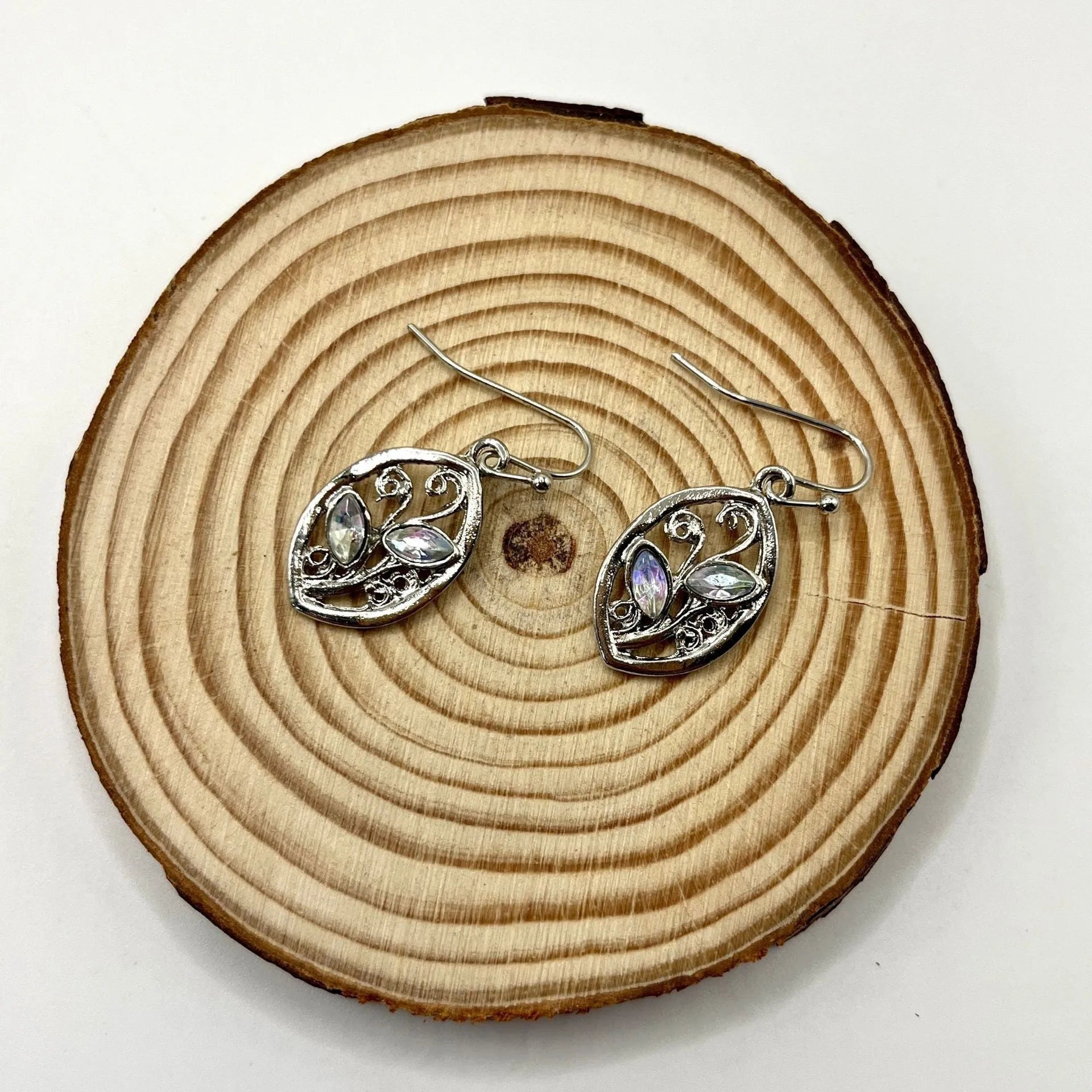 Silver leaf-shaped earrings with colourful moonstone elements for women