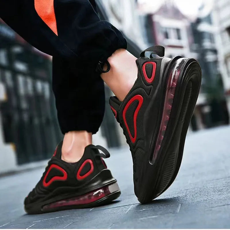 Men's black casual sneakers with lace-up front and a thick air cushion sole.