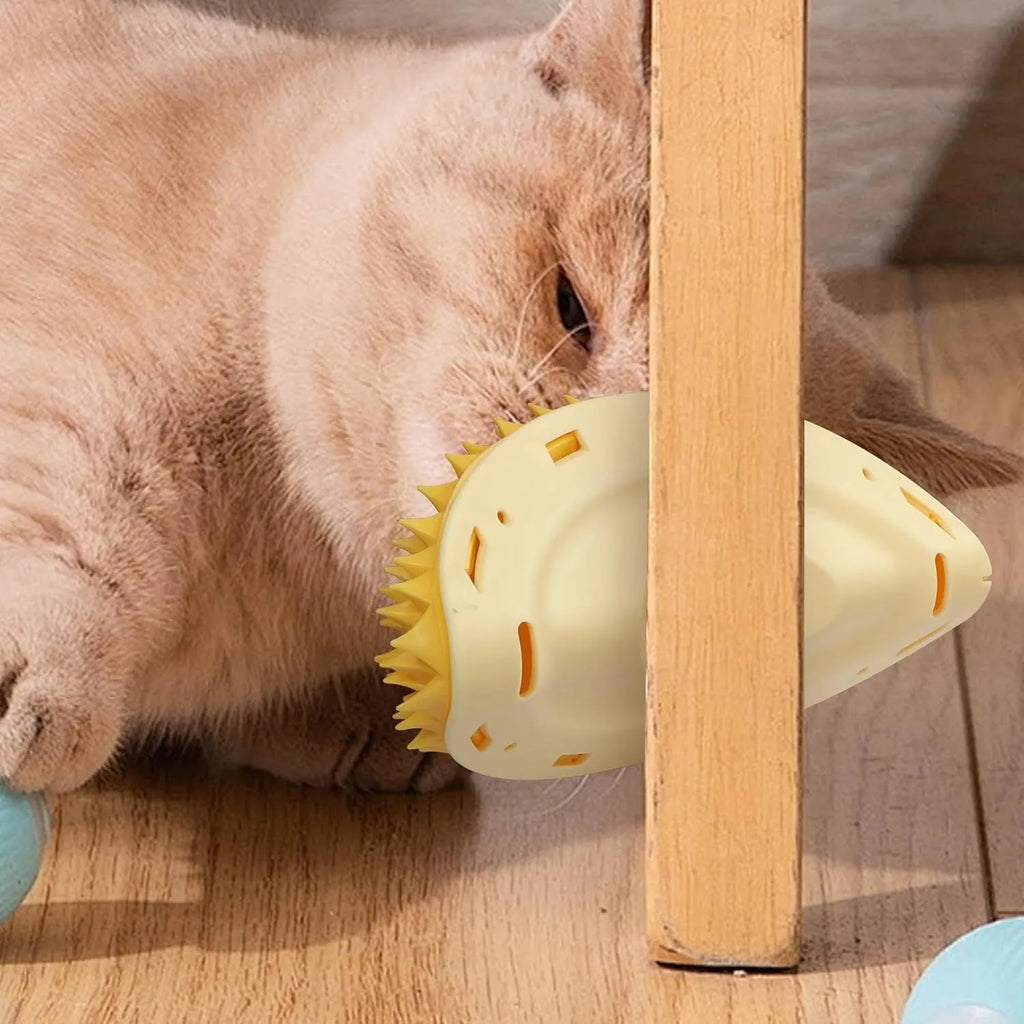 Yellow durian-shaped cat corner scratcher with comb teeth and cat mint packet mounted on wall