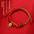 Hand-woven cinnabar peace buckle bracelet in emperor red sand colour with geometric design