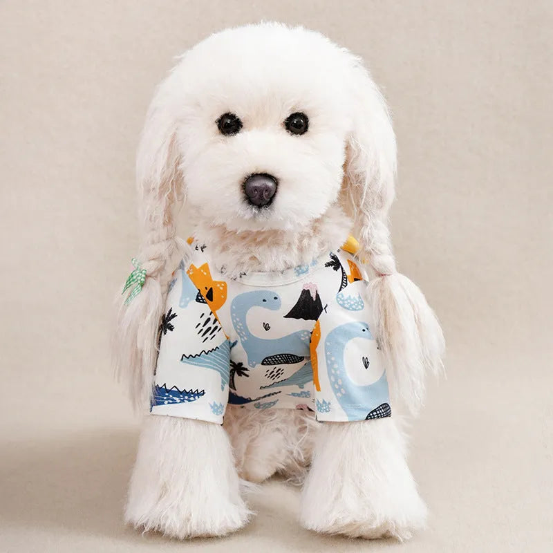 Small dog wearing a full-printed blue polyester T-shirt, showing the casual fit and design.