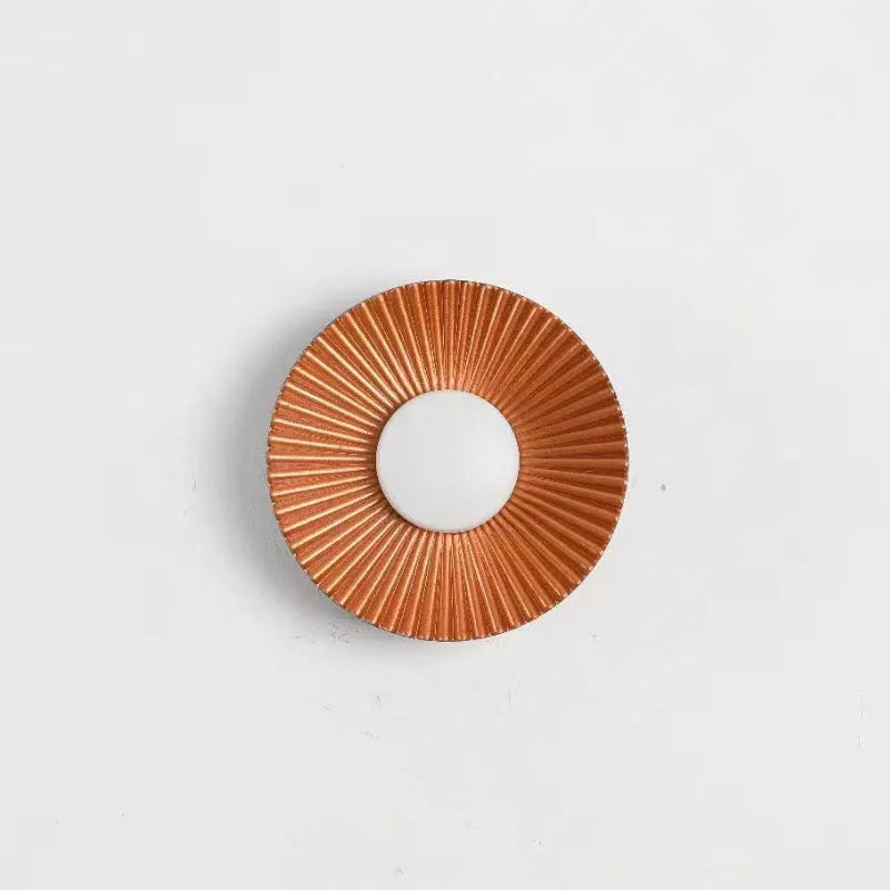Round aluminium wall lamp with LED light in a choice of six colour finishes.
