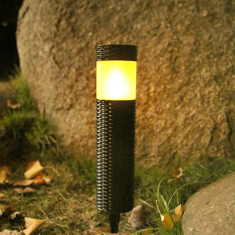 Outdoor waterproof solar garden light with abstract design and simulated flame effect lighting