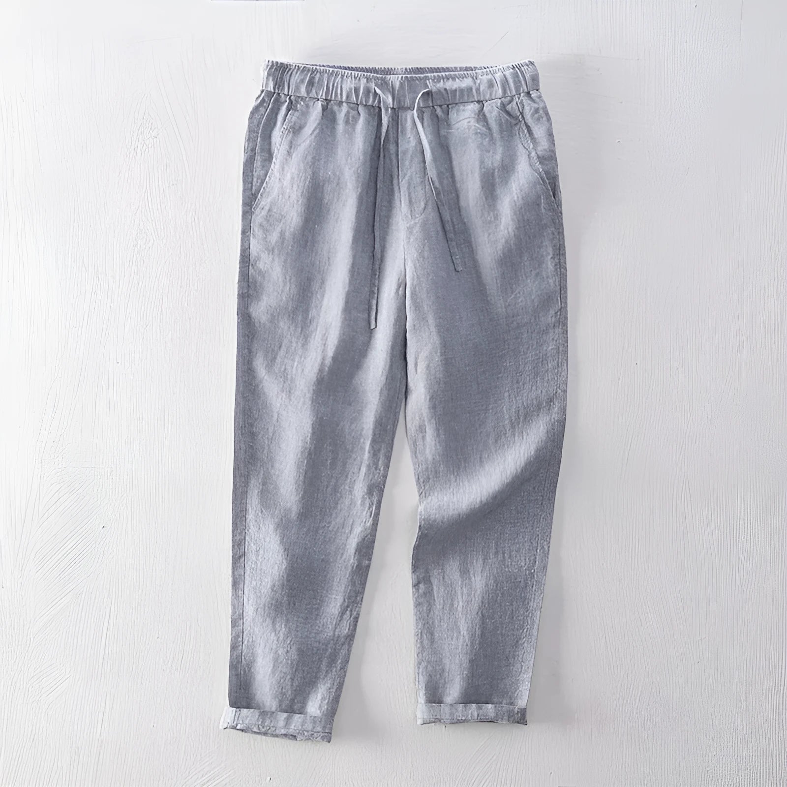 Men's straight-leg linen trousers in mid-waist design showing colour options