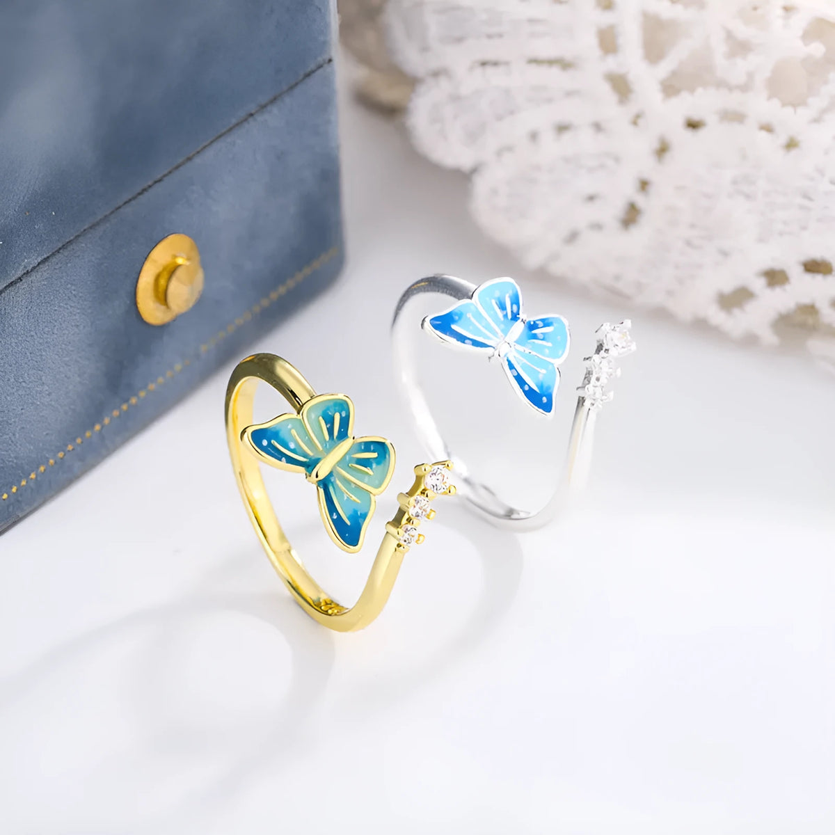 Copper butterfly ring with blue epoxy inlay, adjustable opening, silver colour, simple animal style