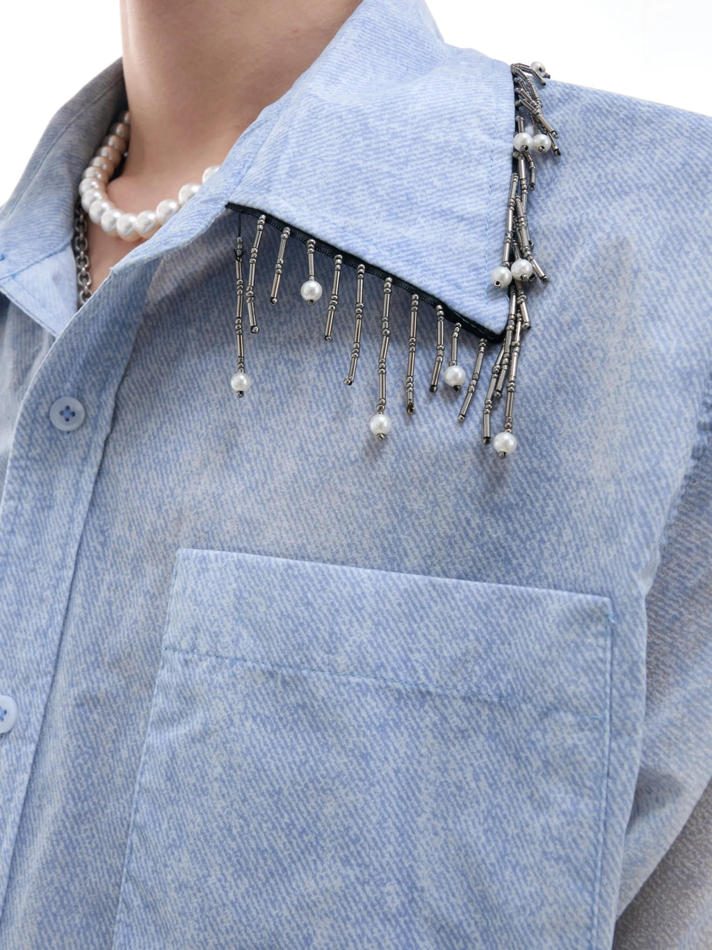 Blue and white gradient loose short shirt with half sleeves on a hanger.