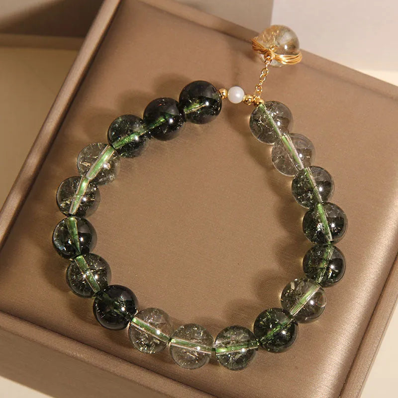 Green phantom quartz and chorite crystal bracelet with winding transfer beads