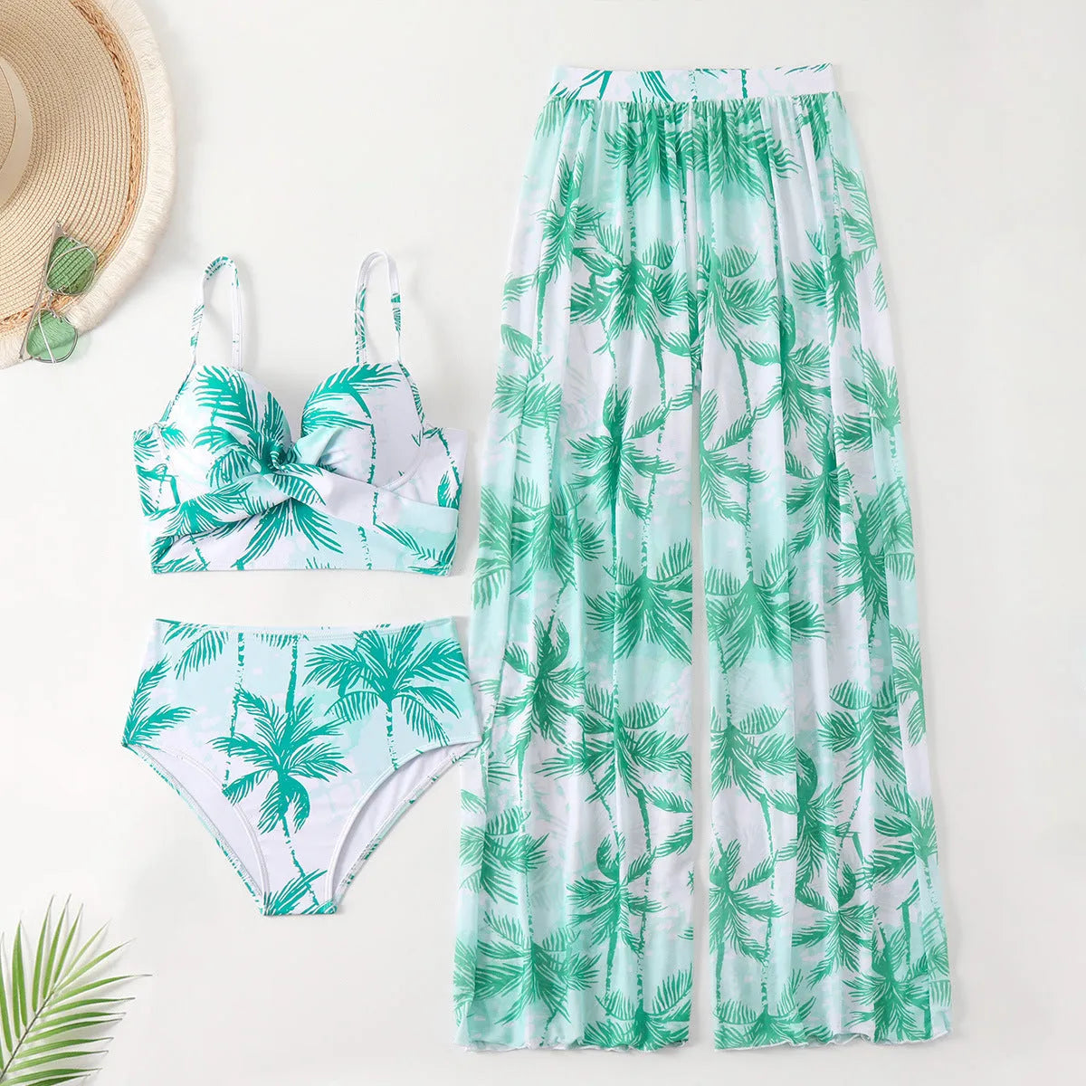 Women's three-piece bikini set in printed polyester and spandex with top and pants, available in black blue emerald green