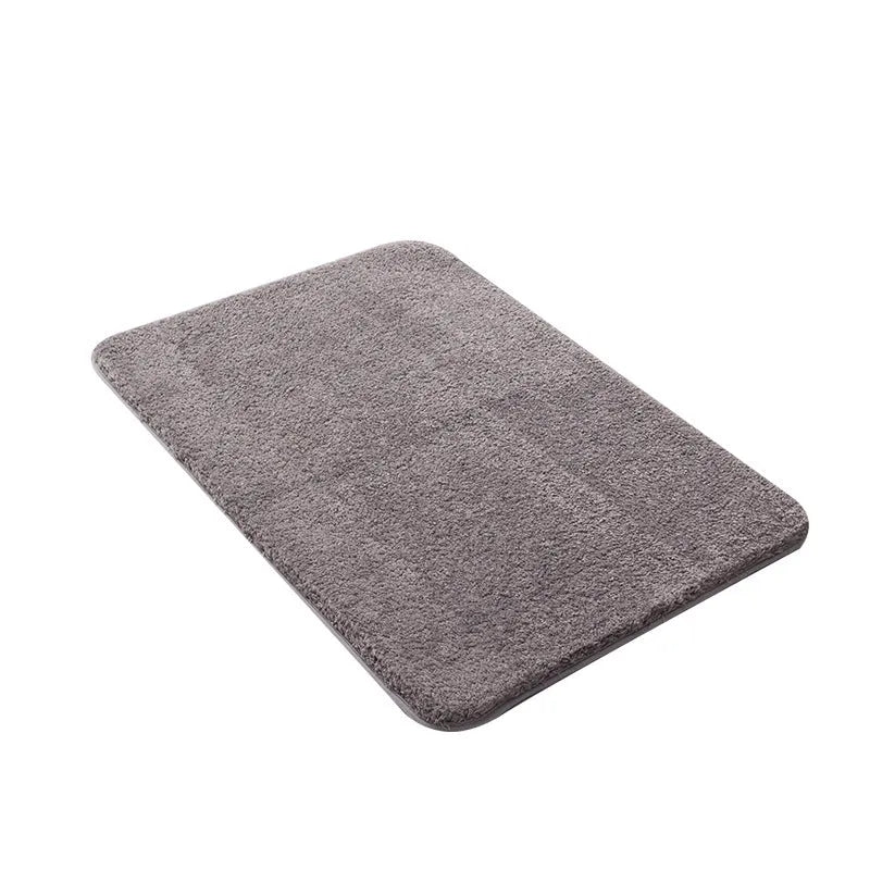 Square absorbent non-slip polyester floor mat in solid colour, available in 12 colours and 4 sizes for bathroom or kitchen.