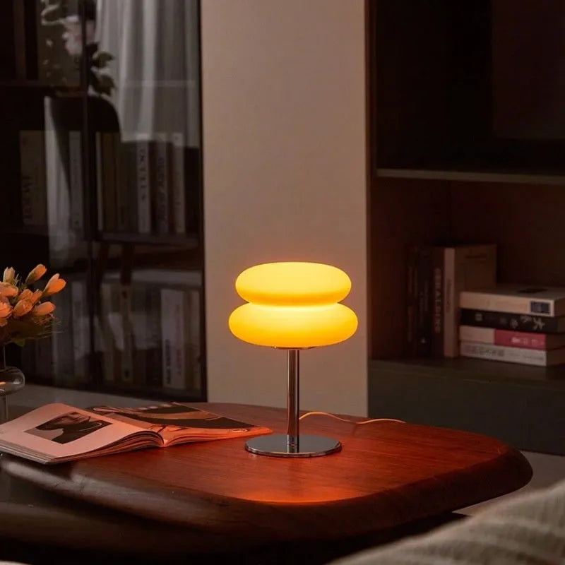 Desktop small table lamp with glass lampshade and USB plug-in tri-colour lighting on a wooden desk