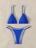 Women's white or blue polyester bikini swimsuit in European and American sizes for swimming