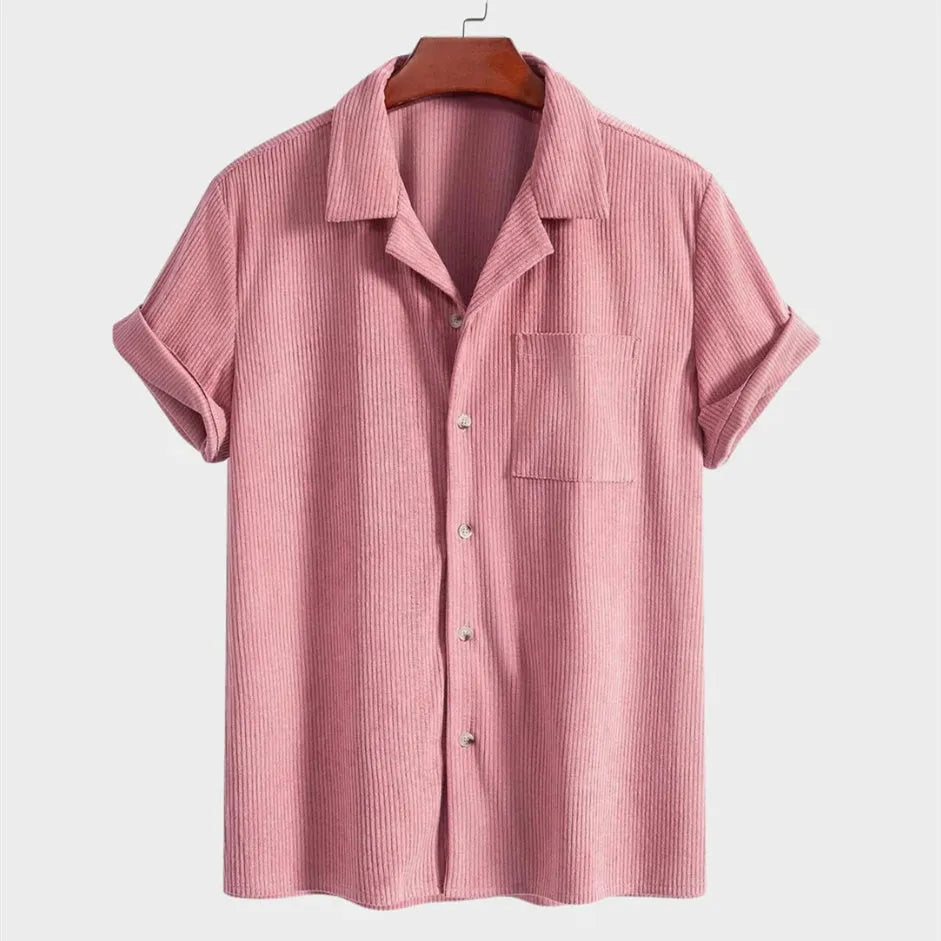 Men's casual solid colour shirt in pink, with pockets, made of polyester fiber, shown on a model.