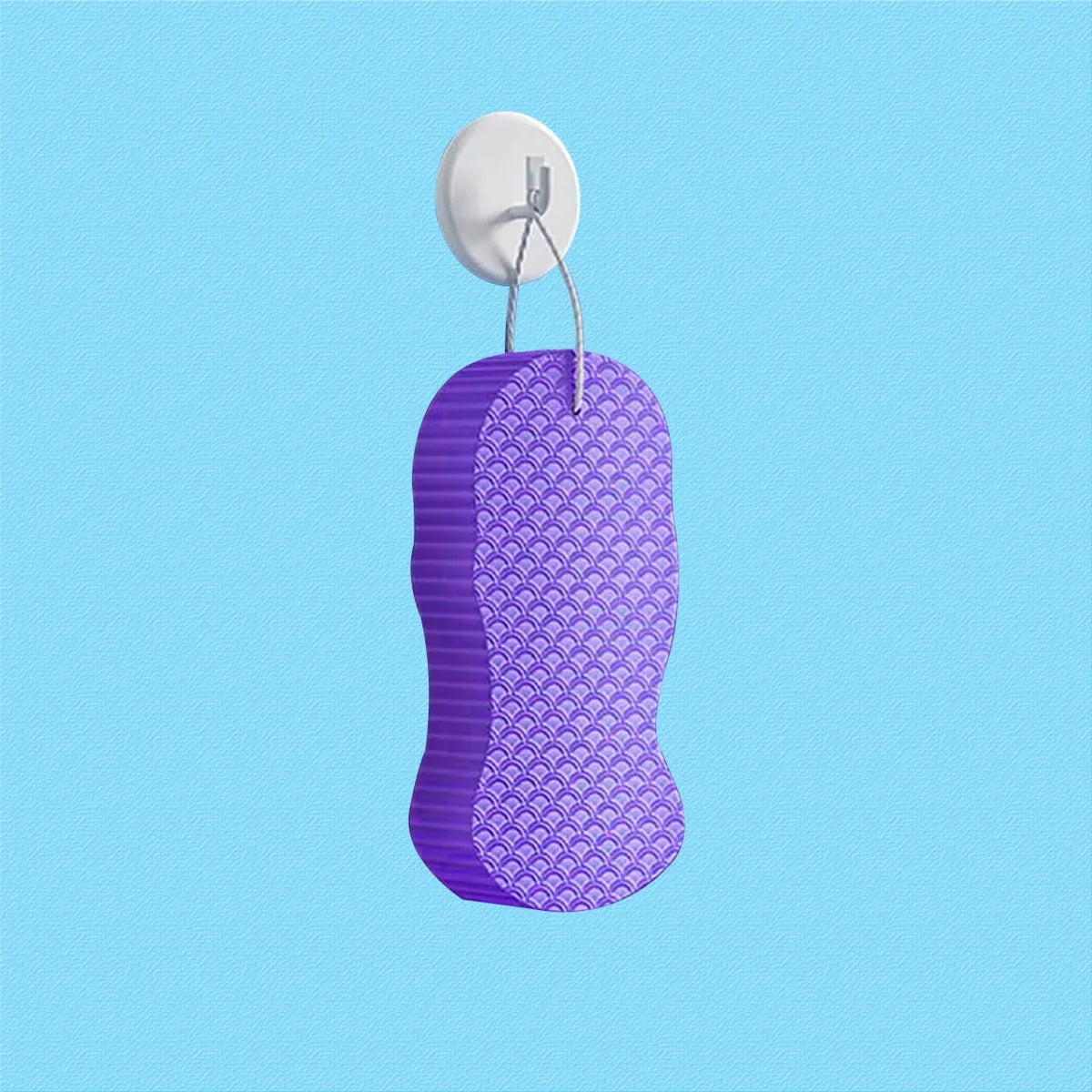 White 3D fish scale pattern bath sponge with hang loop on a bathroom background.