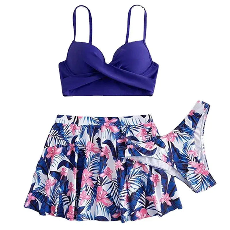 Women's high-waisted three-piece bikini swimsuit set in polyester fabric with belly coverage