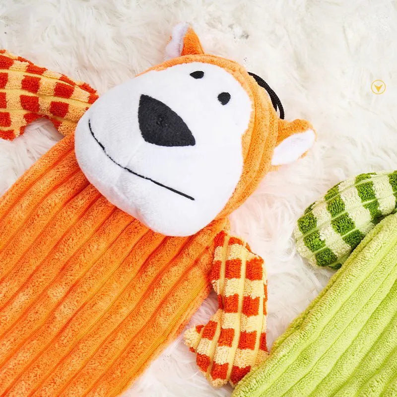 Green and orange durable rubber dog toy with squeaker for aggressive chewers.