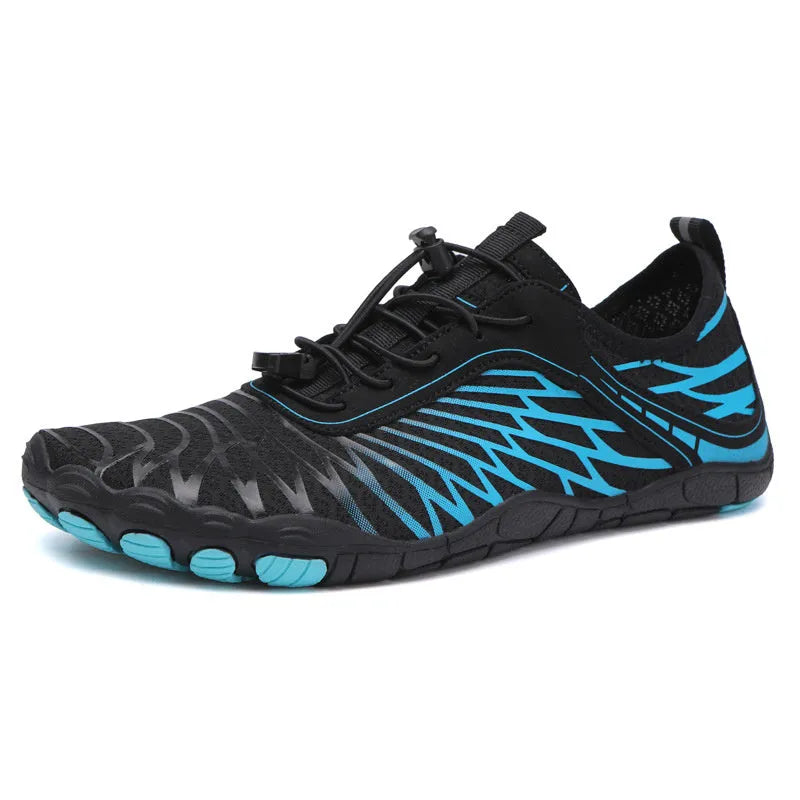 White and pink lace-up upstream sports shoes with a rubber sole on a neutral background.