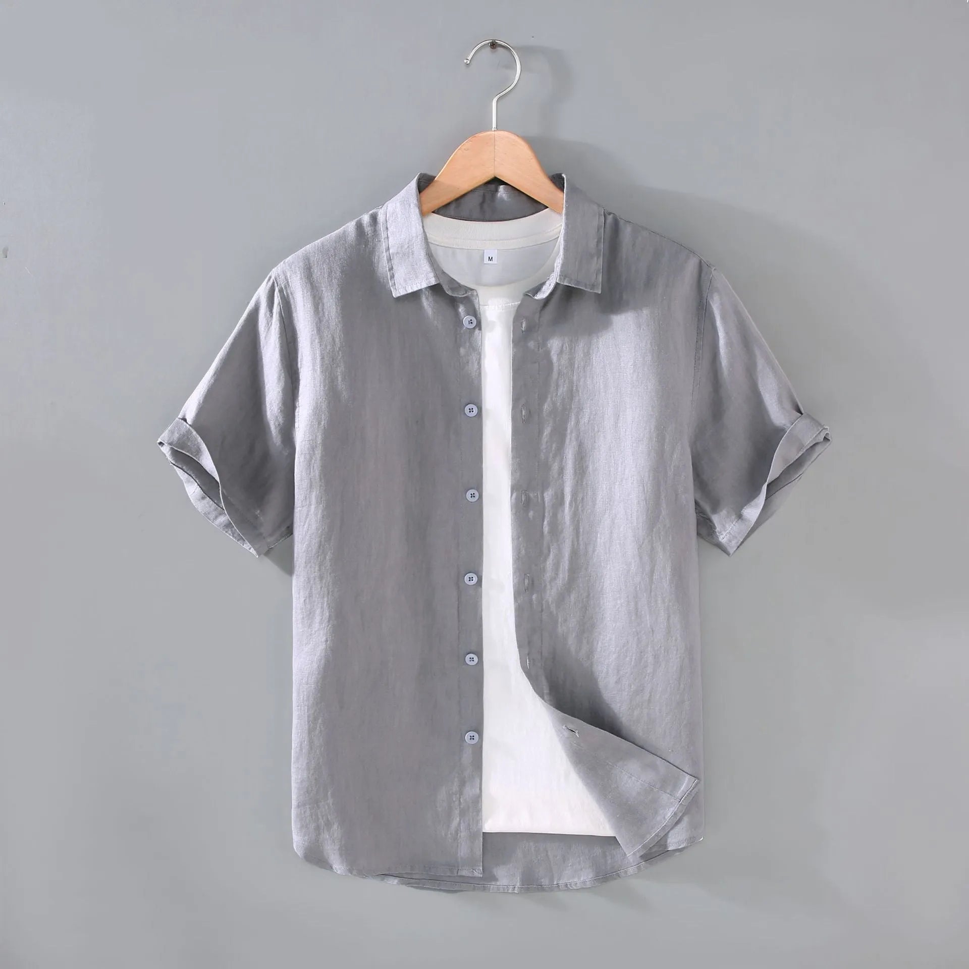 Men's casual short-sleeved linen shirt in regular cut available in seven colours including apricot, dark blue, and purple