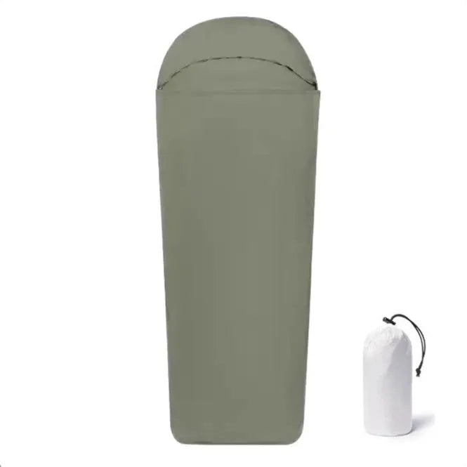 Blue mummy-style camping sleeping bag made from matte nylon fabric, shown rolled and unrolled.